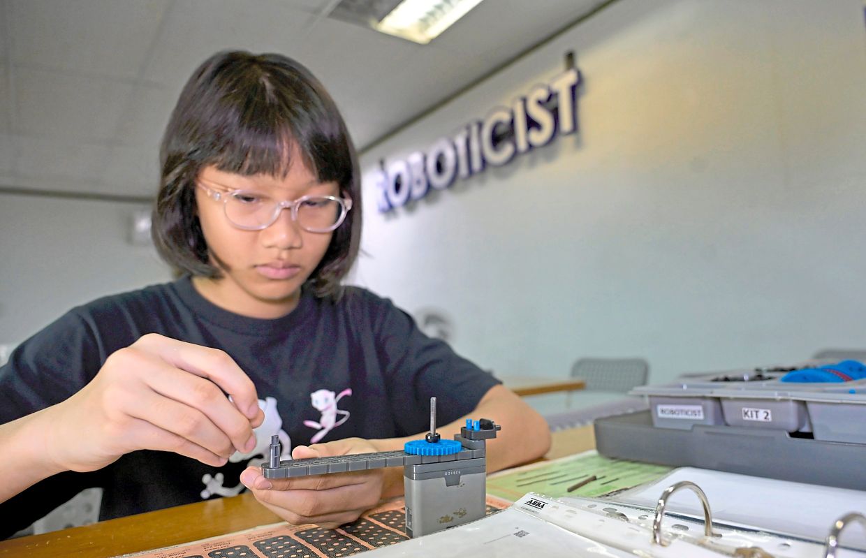 Hana Zulaikha, 11, hopes to create a fast-moving robot. — RAJA FAISAL HISHAN/The Star