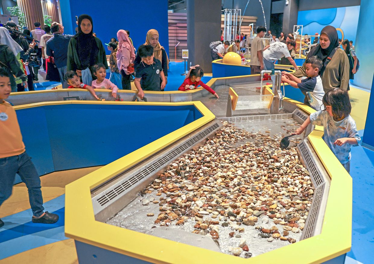 Children having fun at the waterplay zone.