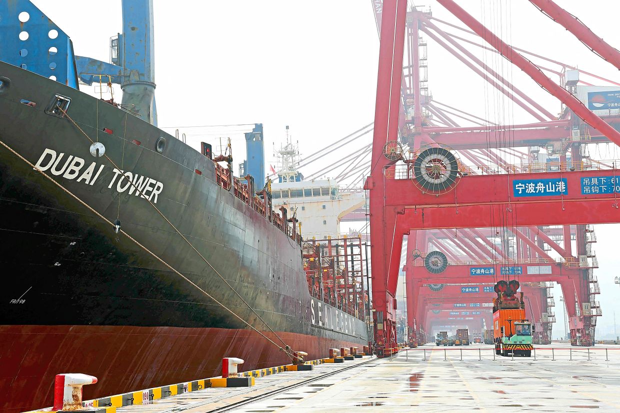 Ship transits through Arctic, halving travel time