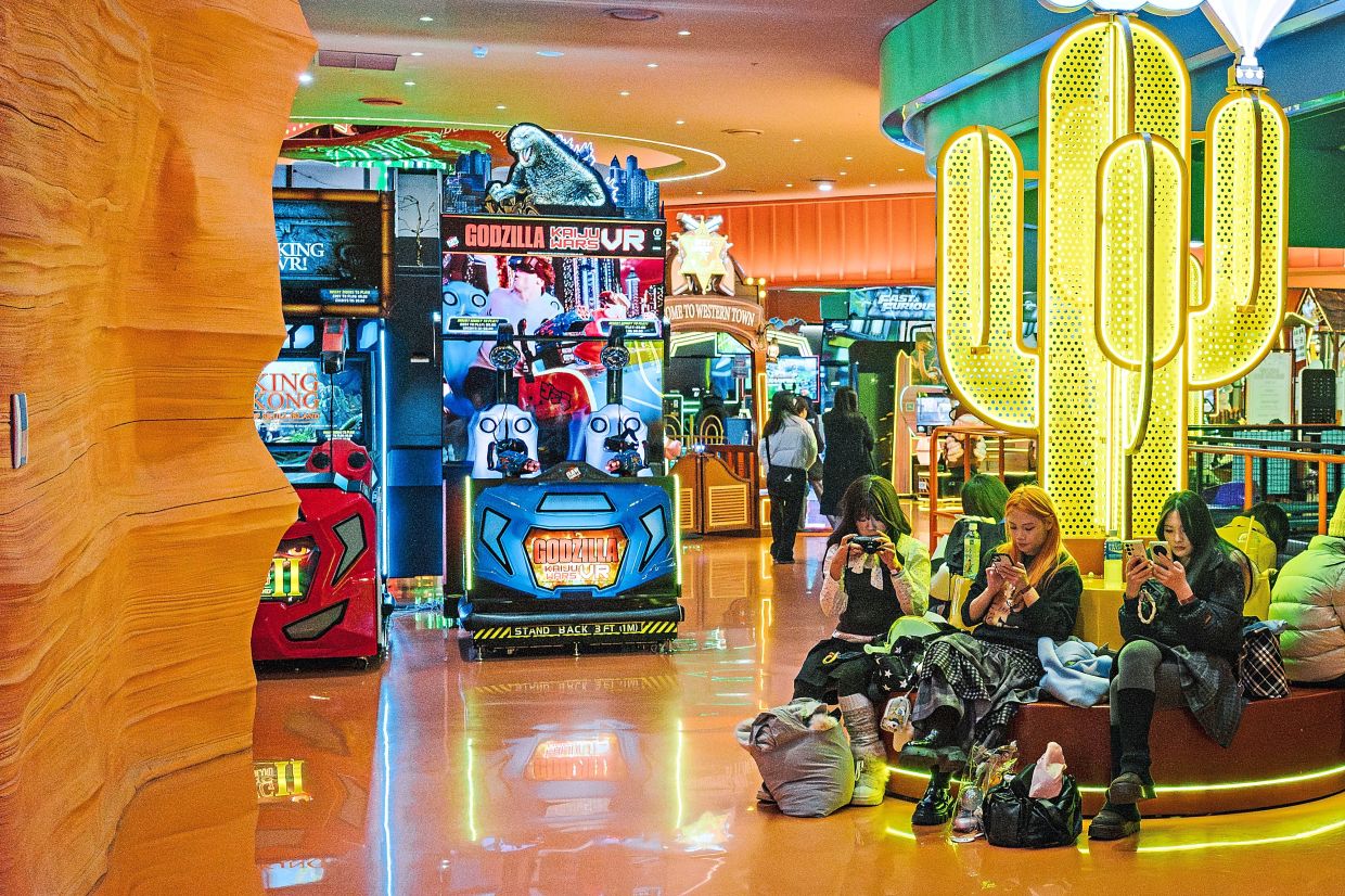 Visitors resting at Jjangland, an arcade at the Inspire Entertainment Resort, in Incheon, South Korea. — Jun Michael Park/The New York Times