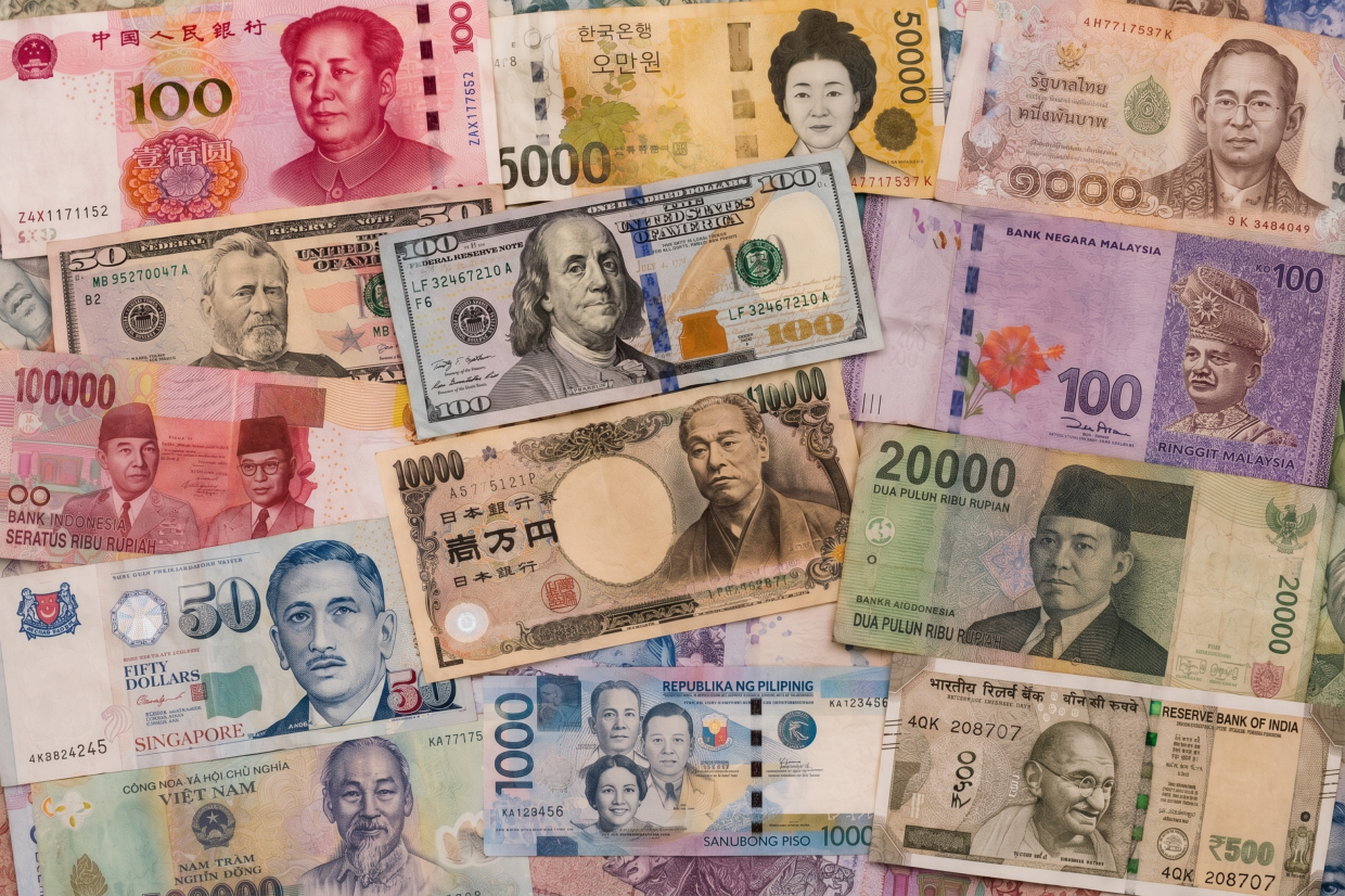 Taiwan dollar leads EM Asian FX gains as weaker dollar lifts sentiment