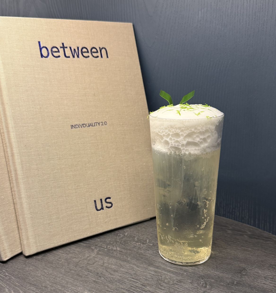 The new menu, Between Us, celebrates the spaces in between the individuals. at the bar.