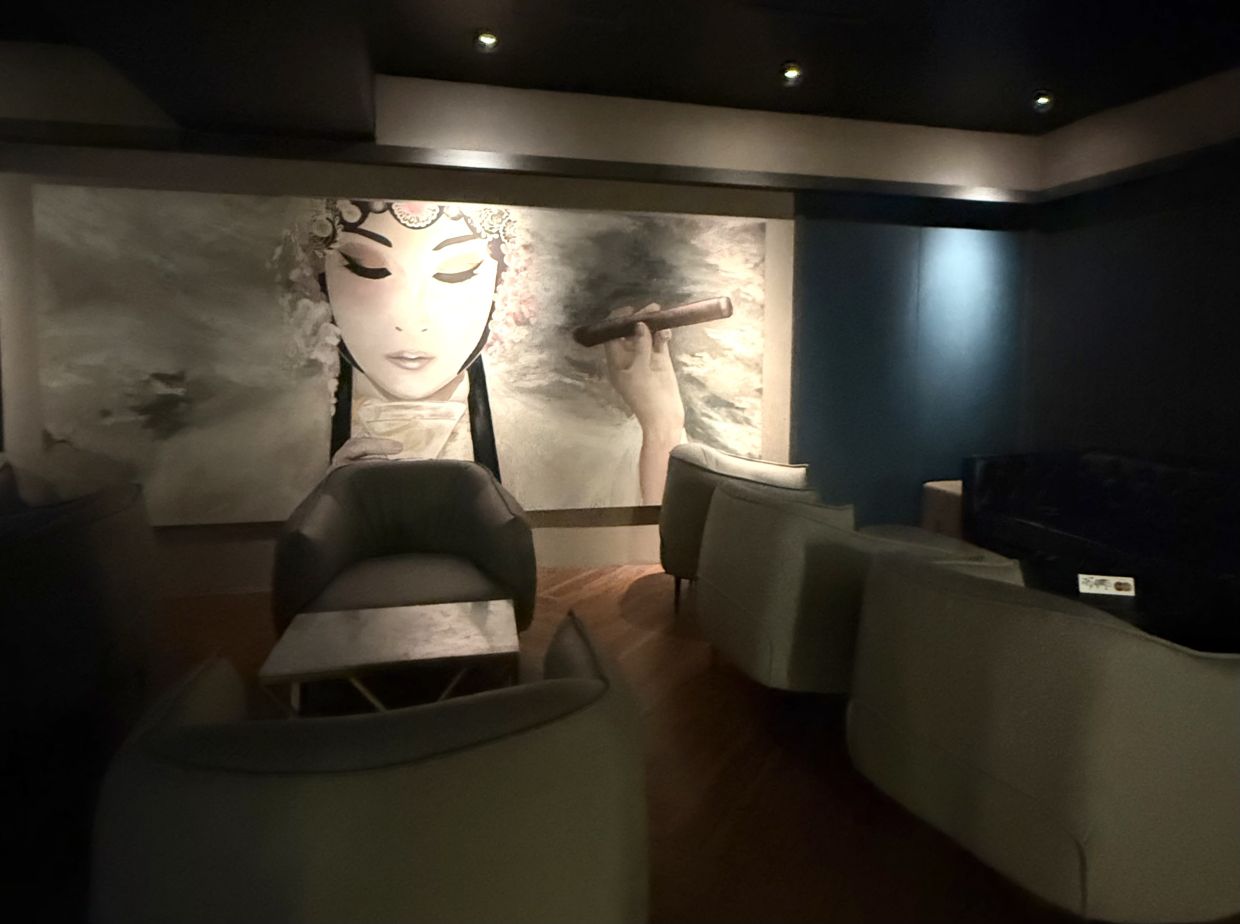 The interior has been spruced up, but the iconic 'muse' mural remains at the centre of the bar.