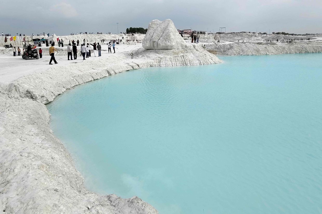 This sprawling expanse of white marble waste in India is drawing tourists, filmmakers and content creators. — AFP