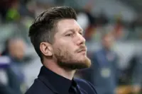 Soccer-Pocognoli targets bright future for Scotland on foundation laid by Clarke