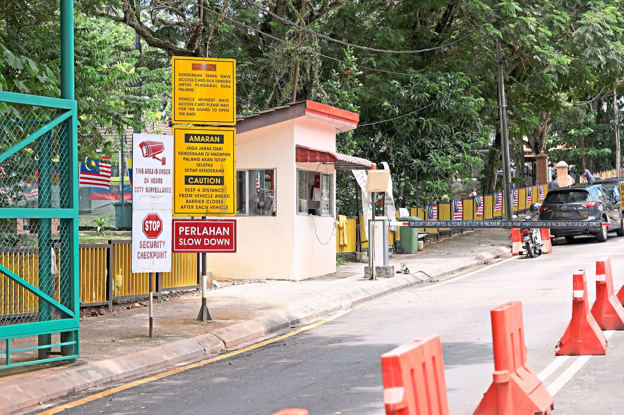 The existing guarded main entrance at Jalan Desa Ria, Taman Desa in Kuala Lumpur.