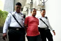 Lorry driver pleads not guilty to reckless driving causing deaths of mother, son