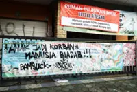 Indonesian court begins trial of daycare staffers in alleged child abuse case