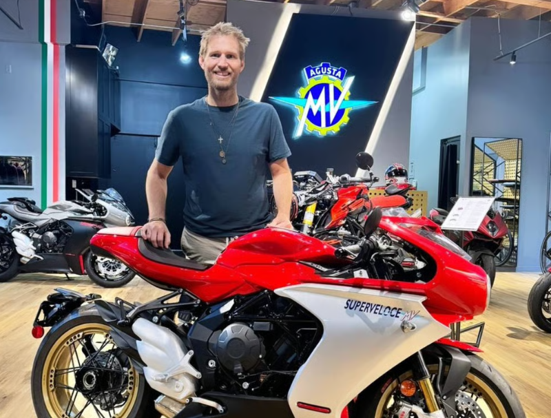 Brian Hickerson poses with an MV Agusta motorcycle in 2024. Photo: MV Agusta Los Angeles/Instagram
