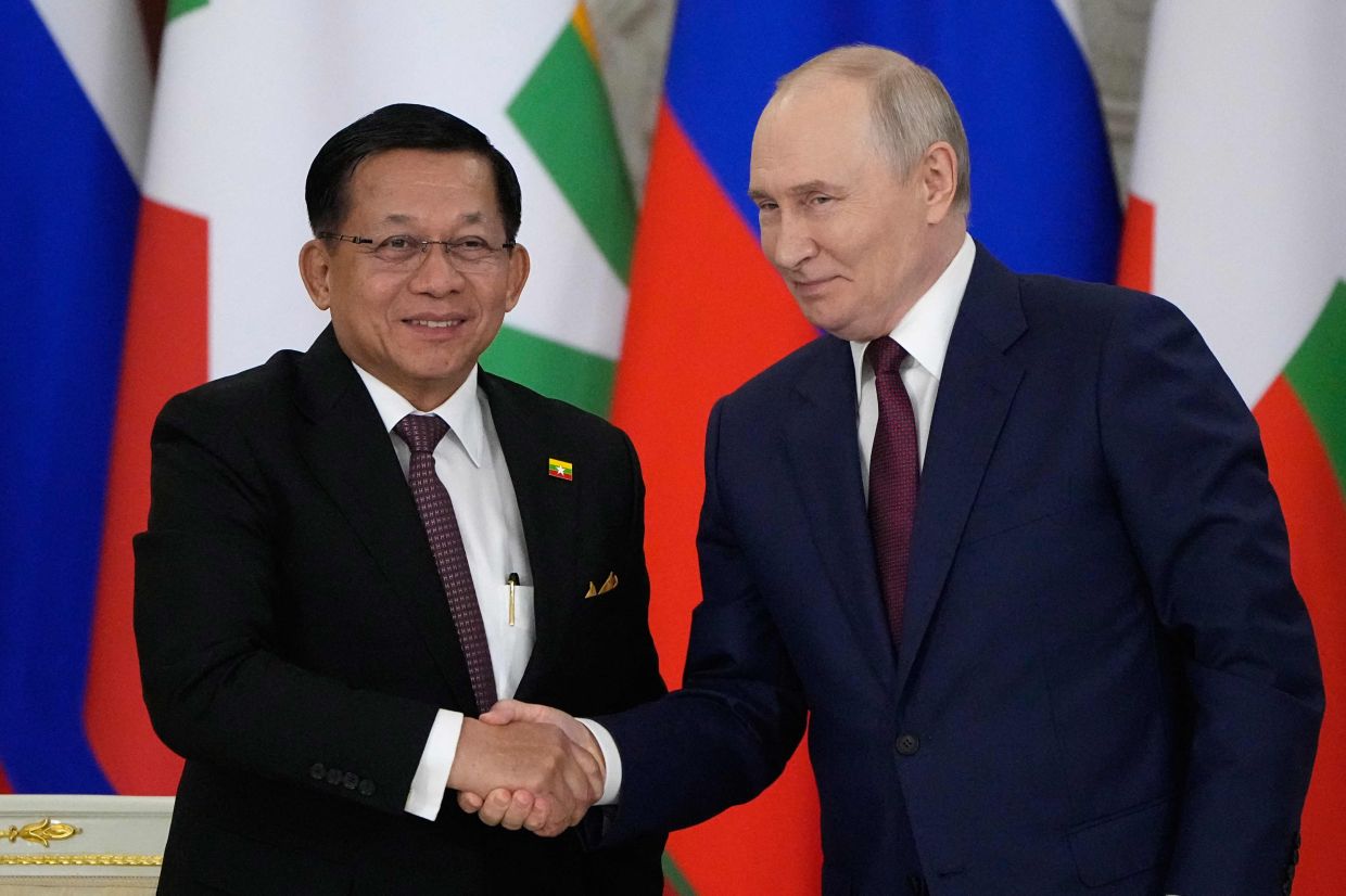 Russian President Vladimir Putin greeting Myanmar President Min Aung Hlaing during their bilateral meeting at the Grand Kremlin Palace in Moscow, on Aug 18, 2026. - AFP