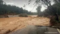 Flash floods cut major roads and inundate homes in northern Thailand