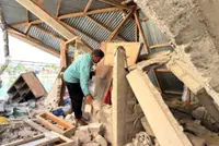 Indonesia family finds 84-year-old paralysed woman alive days after earthquake