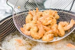Taiwan charges 15 people, four firms over tainted cooking oil