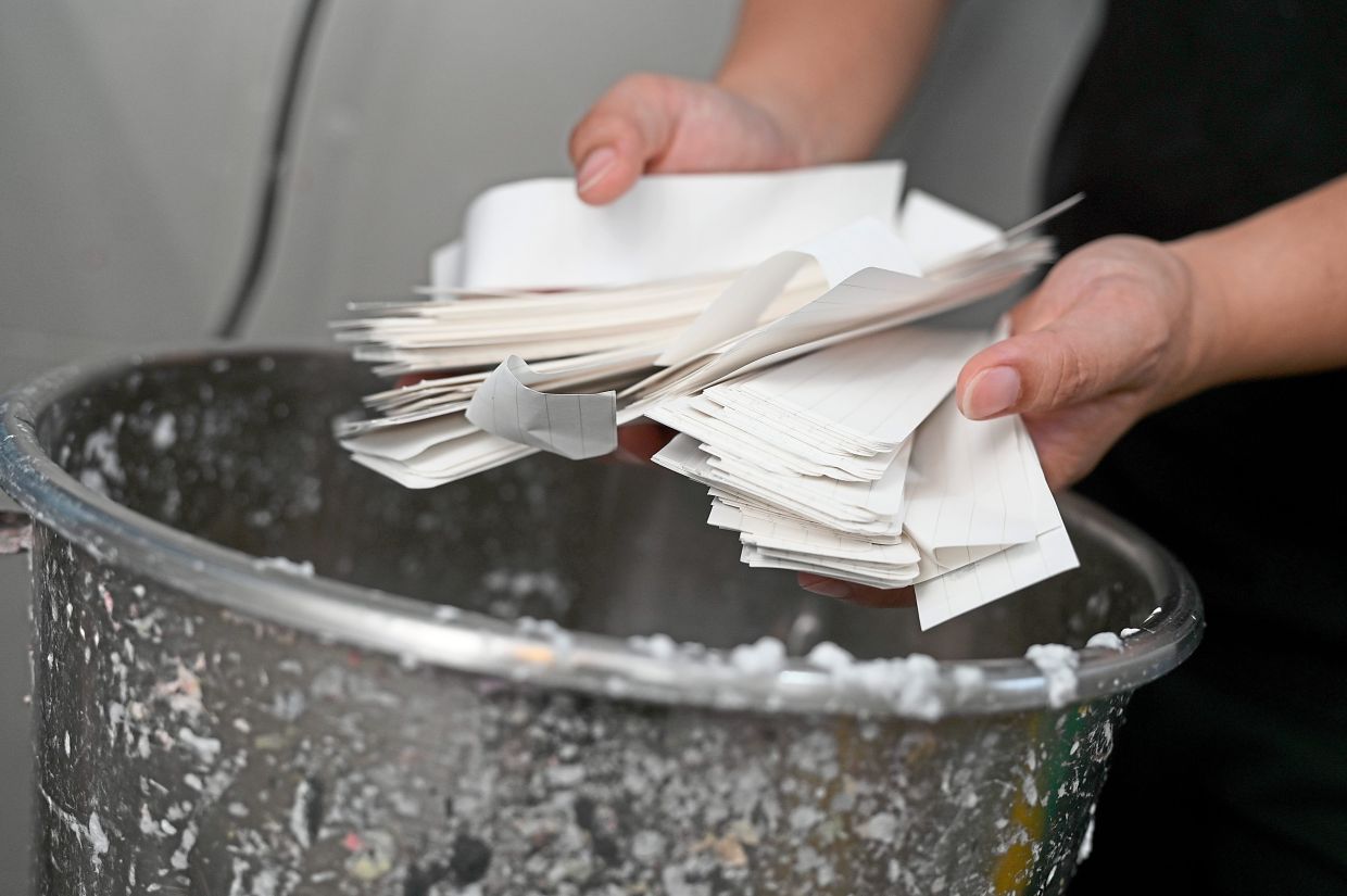 Used paper is blended with water to create the pulp used to make handmade sheets.