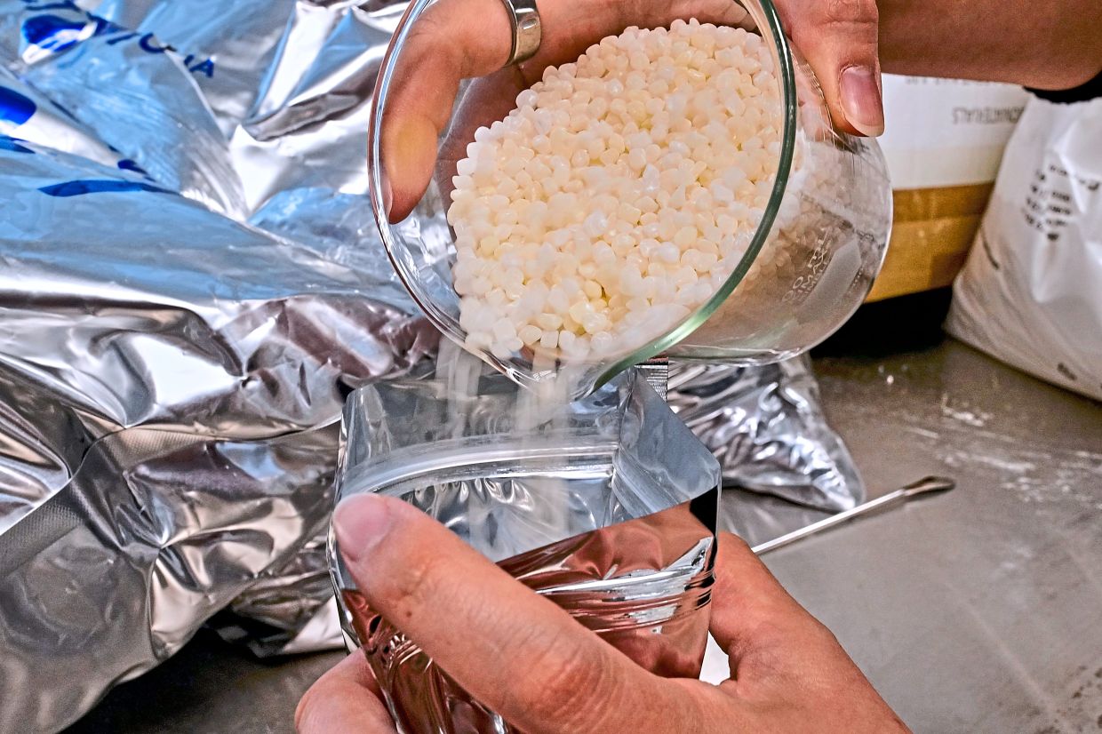 The biopolymer pellets used to manufacture a variety of compostable cups and utensils.