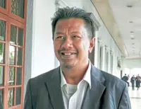 Ex-bank CEO denies fraud charges