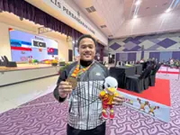 Ridzuan defies back injury to compete and lift title in debut