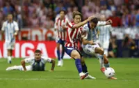 Soccer-Atletico Madrid beat Malaga but Alvarez absence is felt