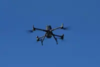 China says 'firmly opposes' Trump drone tariffs