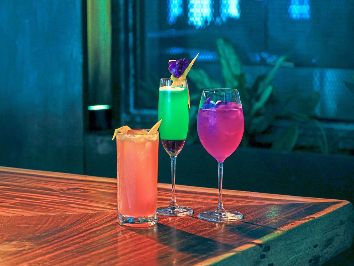 @21 Rooftop Bar is celebrating Merdeka with (from left) Saloma, Rainforest Lumina and Merdeka Spritz.