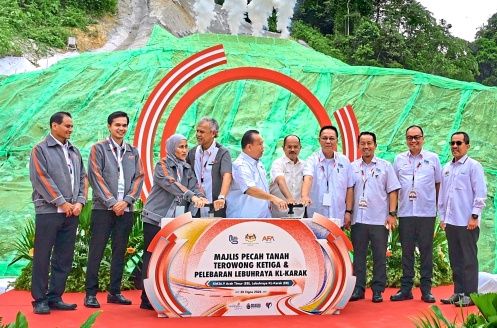 The journey continues: Nanta (fifth from left) officiating the ground­breaking ceremony at the Third Eastbound Tunnel Portal Site in Genting Sempah, accompanied by Mohd Hadzmir (third from right), LLM chairman Datuk Seri Hasni Mohammad (fourth from right) and Azmil (fourth from left), alongside representatives from ministries, government agencies and industry partners. — RAJA FAISAL HISHAN/The Star