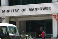 Singapore's Manpower Ministry investigating claims that airport wheelchair assistant had pay docked for being 11 seconds late