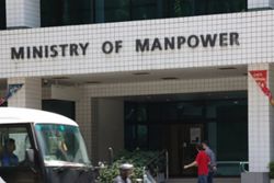 Singapore's Manpower Ministry investigating claims that airport wheelchair assistant had pay docked for being 11 seconds late