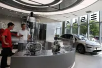 China launches biggest-ever car recall campaign over door handle safety