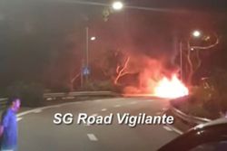 Two Singapore traffic cops taken to hospital for smoke inhalation after vehicle catches fire on BKE