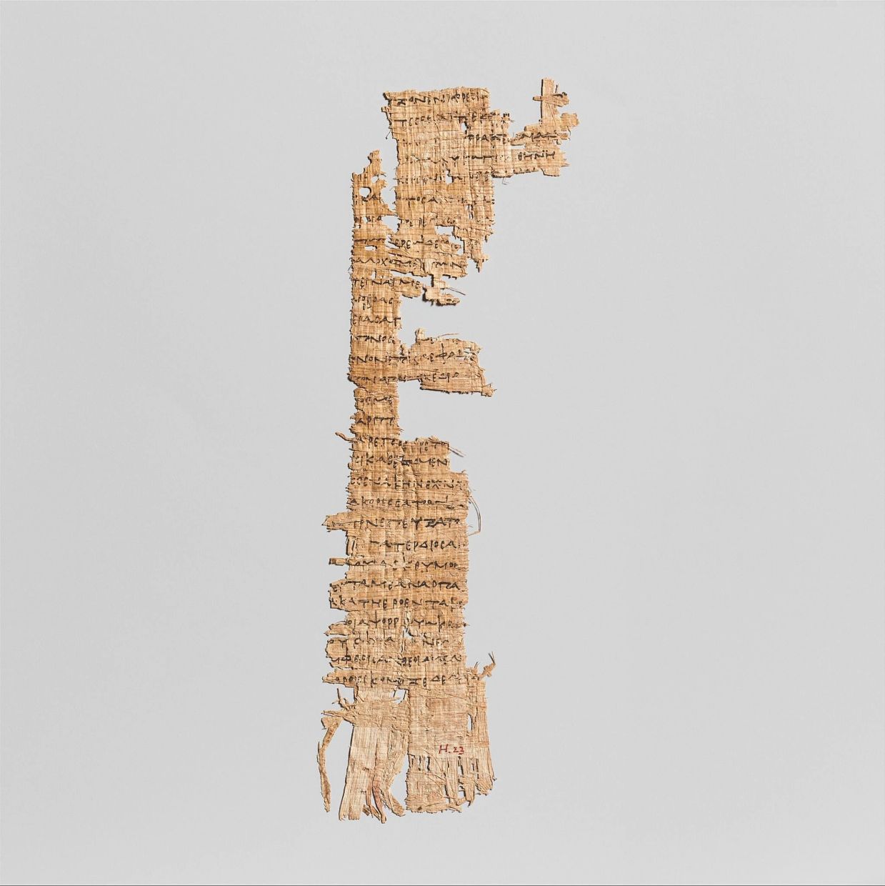 The papyrus fragment on display dates from around 285 to 250 BC, and is considered the earliest written fragment of 'The Odyssey' to be discovered. Photo: dpa