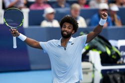 Tennis-Fils powers past Cobolli to reach Cincinnati final