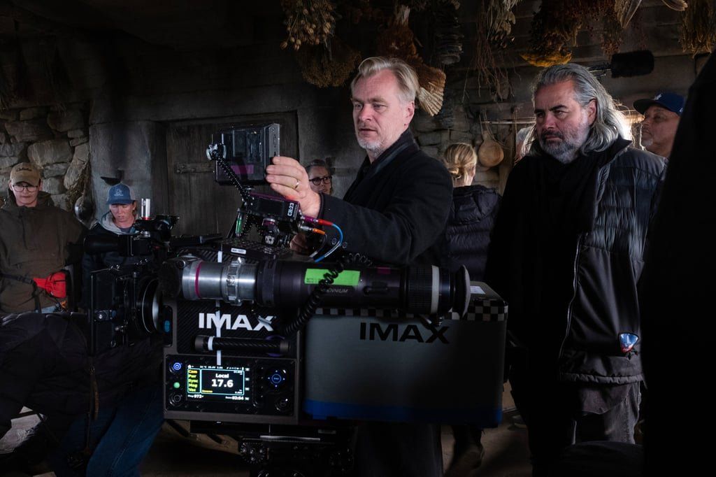 The image above features director Christopher Nolan, centre, flanked by cinematographer Hoyte van Hoytema, right, during the production of “The Odyssey.” -- Photo: Melinda Sue Gordon/Universal Pictures via AP