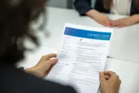 Picture-perfect AI resumes push firms back to tests, referrals