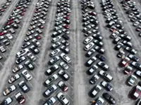 Trump threatens 50% tariffs on all cars and trucks from Canada amid trade fight