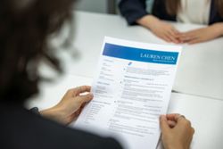 Picture-perfect AI resumes push firms back to tests, referrals