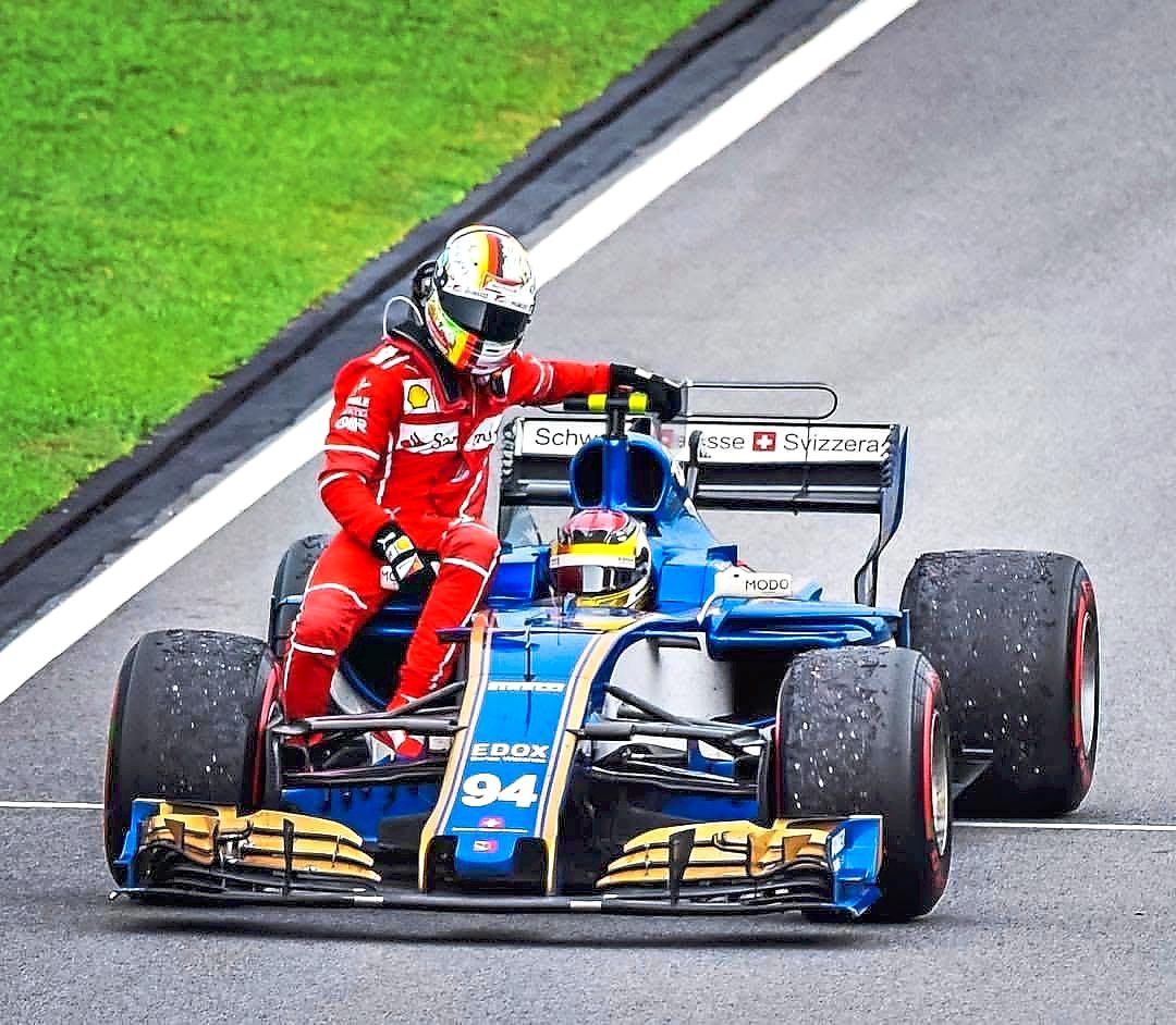 A race to remember: Mohamad Hafiz’s final photo at the 2017 Malaysian Grand Prix captured former German racing driver Sebastian Vettel riding with then-Sauber F1 driver Pascal Wehrlein after Vettel’s Ferrari was damaged in an accident shortly after the race at SIC. — Photo courtesy of Mohamad Hafiz