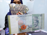 Ringgit ends lower against the greenback