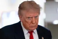 Trump vows to double Canadian auto tariffs, escalating fight