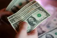 Dollar struggles for traction as markets weigh Iran sanctions, Treasury buybacks