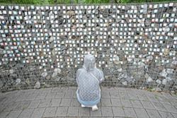 South Korean adoptees longing for their birth mothers leave names on a park wall
