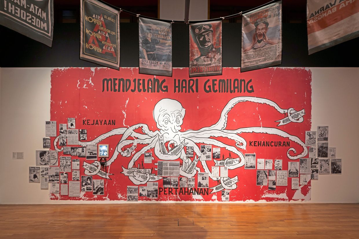 A newly commissioned mural by Jogyakarta-based printmaking collective Krack! revisits wartime visual materials. Photo: National Gallery Singapore