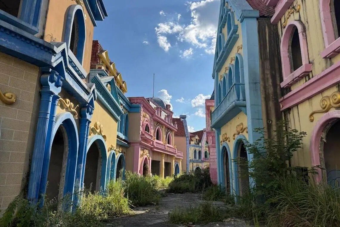 Rows of unfinished pastel-coloured buildings at the Evergrande Cultural Tourism City in Guiyang. But the crowds they were built to impress never came. - Photo: ST