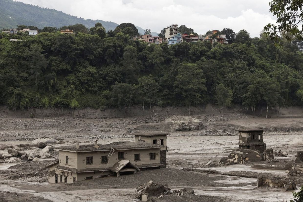 Mud covers a property following a flash flood at Trishuli in Nuwakot district, Nepal, August 26, 2026. - Photo: Reuters