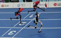 A Chinese humanoid robot sets a new 100-metre sprint record at Beijing Games