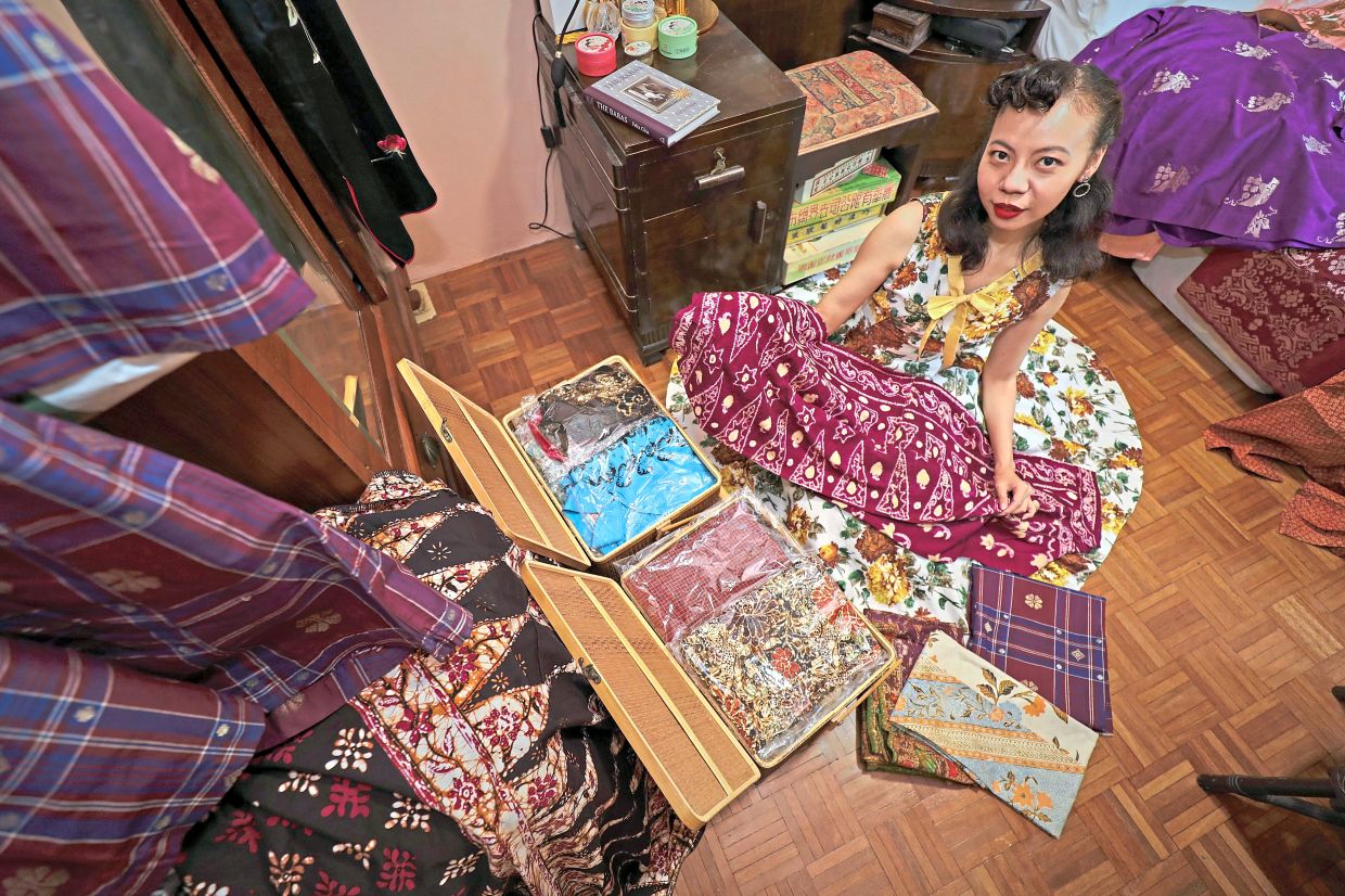 Apart from kebaya and cheongsam, Lim also collects textiles like batik and songket. Photo: The Star/Yap Chee Hong