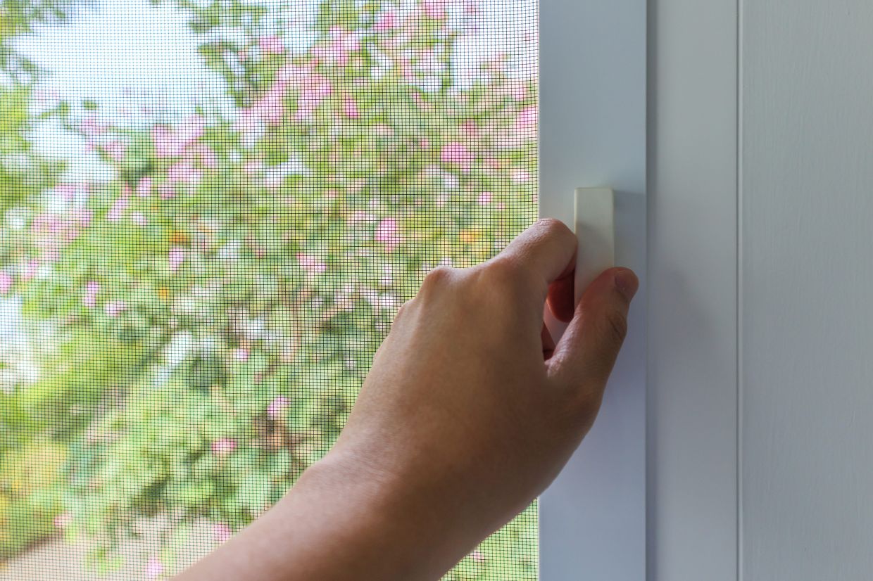 Installing fine mesh window screens creates a simple barrier to prevent mosquitoes from entering the home.