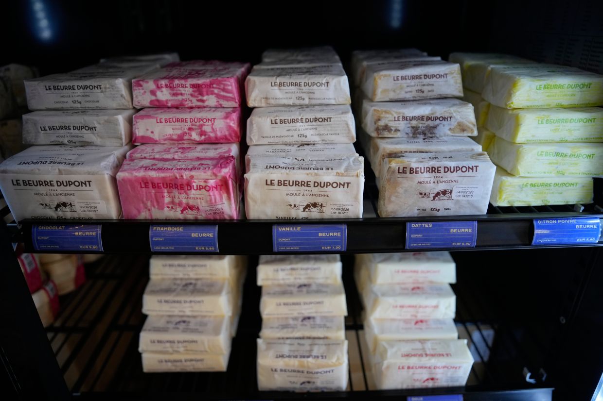 Packs of butter with different flavours are displayed in a refrigerator at Le Butter Shop.