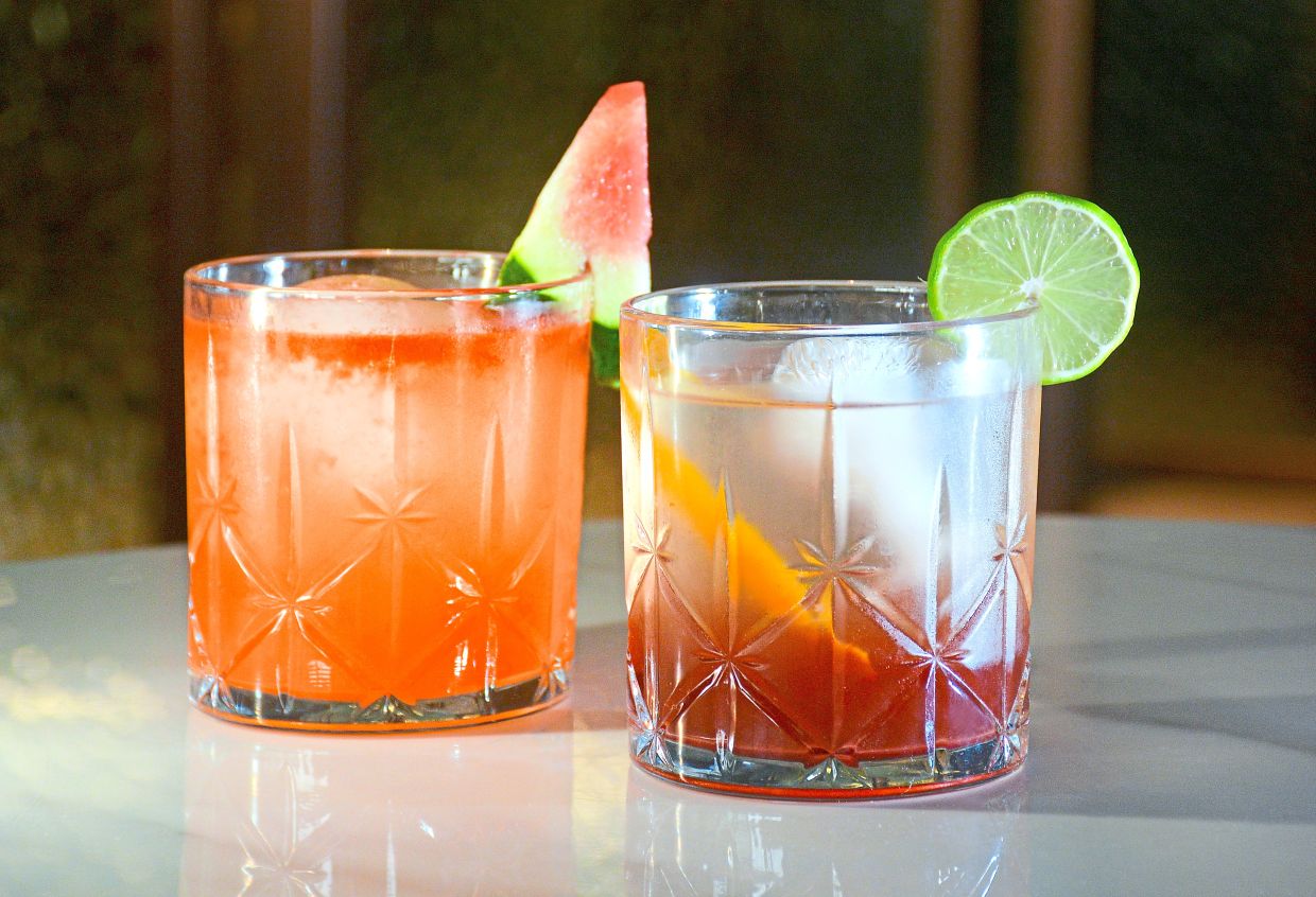 Raksasa Tropika (left) and Nutmeg Whisper are crafted with locally made spirits.
