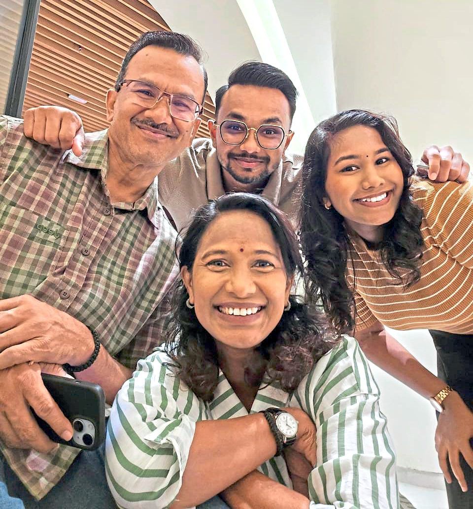 Praying for the best: Logadarrsiny (right) and her brother R. Mithiren are concerned for the safety of their father Raman (left) and mother Neelavany (centre), who are in Nepal.
