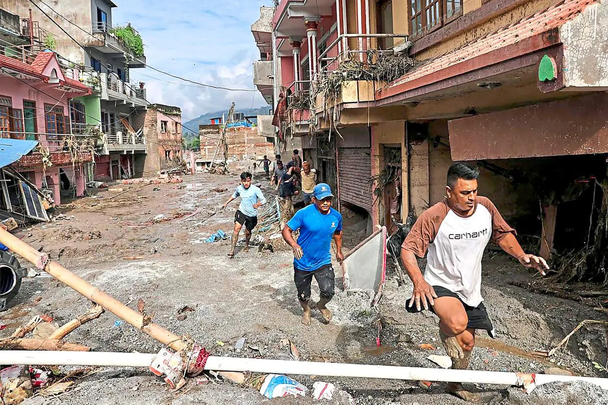 Families of Malaysians missing in Nepal-Tibet floods face agonising wait; two Fire and Rescue officers among unreachable near Everest Base Camp